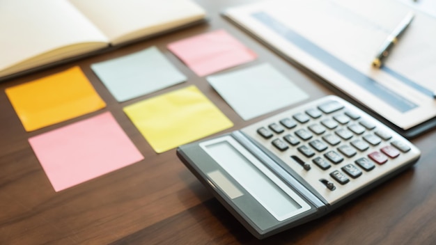 Organized financial workspace with ledger and documents